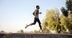 Runner Outside Completing a Training Plan